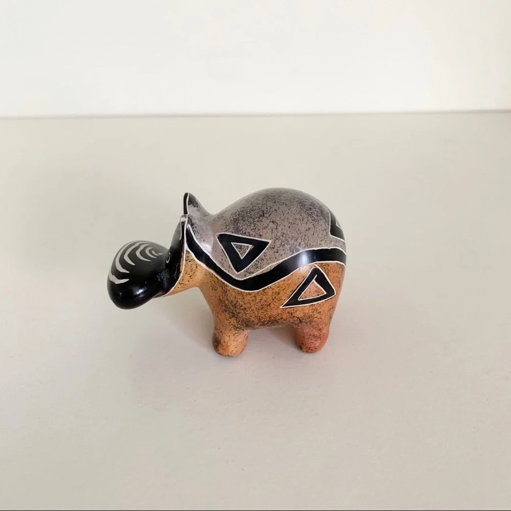 Stone hippo statuette